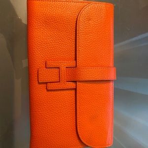 HERMÈS ORANGE CLUTCH